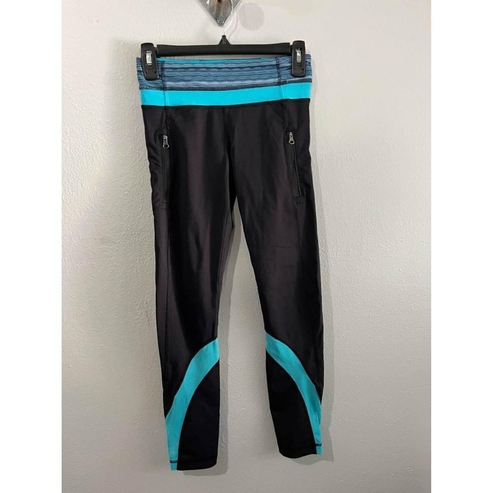 Lululemon Athletica Inspire Tight Size 4 Black And Teal Side Pockets With Zipper